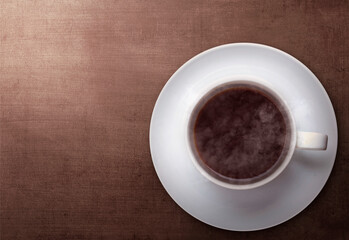 Cup of hot coffee on the table