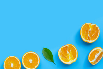 High vitamin C, Juicy and sweet. Fresh orange fruit  on blue background.