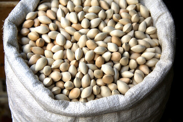 Pistachio nuts in a bag, Concept image for ingredient of bakery industry or organic foods