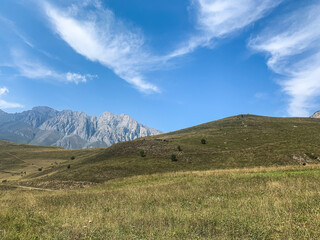 Naklejka premium Meadows and field in the mountains