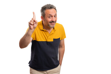 Smiling adult man making idea gesture using index finger