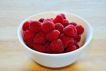 Ripe red raspberry berries close up. Natural vitamin food