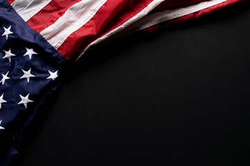 Happy Veterans Day. American flag on black background with copy space.