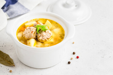 Light low calorie healthy  meatball soup. Space for text.