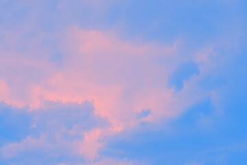 Abstract pink and blue watercolor blurred sky background