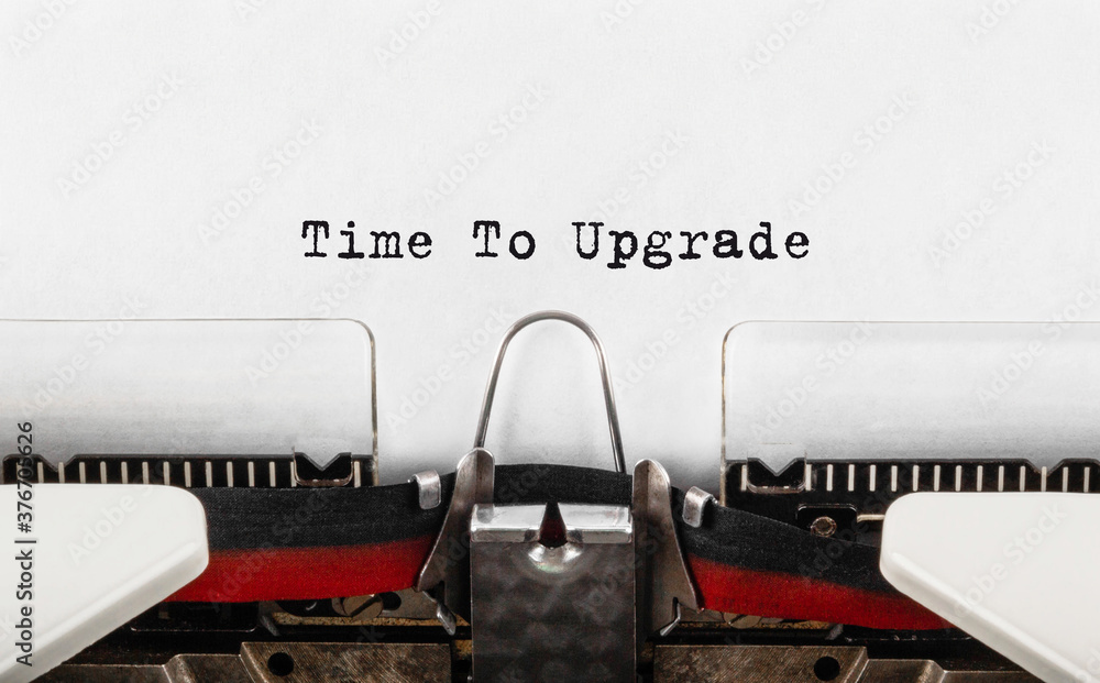 Poster text time to upgrade typed on typewriter