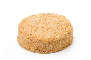 One caramel cake isolated on white background