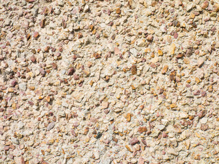 Concrete wall background with stones