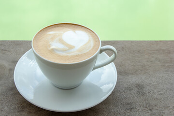 closeup hot coffee on wooden table