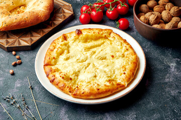 Georgian baked pie with salted and melted cheese - Megrelian khachapuri. Swlwctive focus