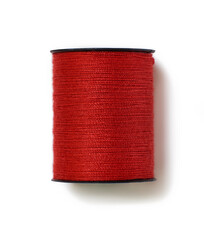 Overhead view of red cotton reel isolated on white background