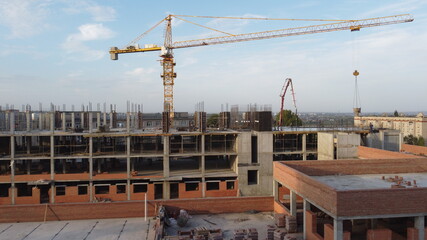 Naklejka premium construction site with a crane.construction of a multi-storey building