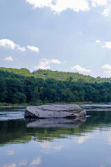 Fototapeta na wymiar rock on the river