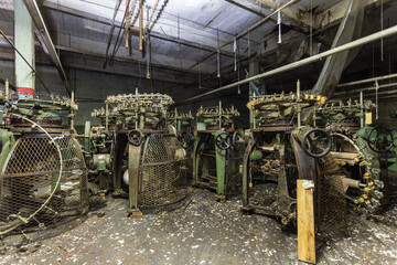 Several industrial machines left abandoned in a forgotten factory in the deep south