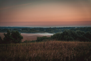 Obraz premium sunset over the river