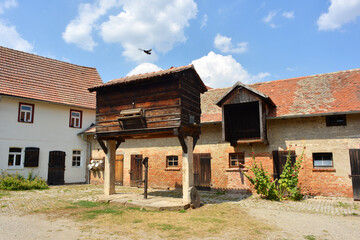 Fototapeta na wymiar Farm with old pigeon house in Germany
