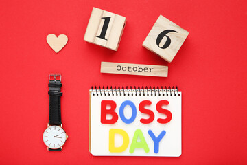 Inscription Boss Day with wrist watch and wooden calendar on red background