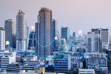 Fototapeta na wymiar Financial stock chart hologram over panorama city view of Bangkok, business center in Asia. The concept of international transactions. Double exposure.