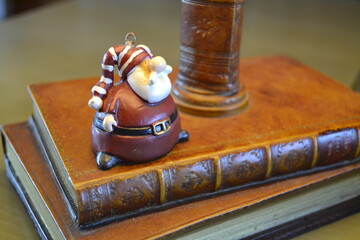 stack of old books with santa