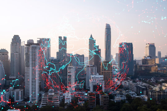 Glowing hologram of Earth planet map on aerial panoramic cityscape of Bangkok at sunset, Asia. The concept of international business. Multi Exposure.