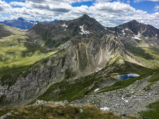 Fototapeta na wymiar Panoramic view of the Lukmanier pass in Switzerland from the top of Pizzo dell'Uomo.