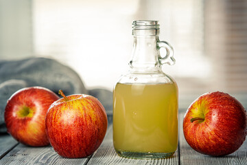 Unlit freshly squeezed Apple juice. New crop of apples. Freshly washed fruit on the table. Healthy diet