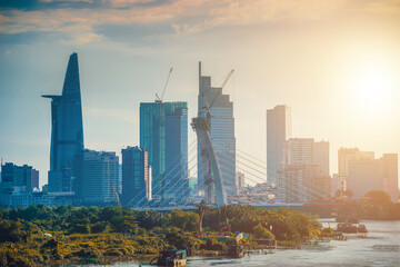 Aerial view of center Ho Chi Minh City, Vietnam with Bitexco Financial tower, Thu Thiem 2 bridge,...