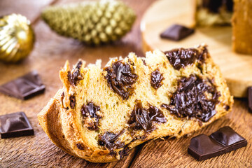 homemade chocolate panettone slice, punctual focus, typical Christmas dessert in several countries in the world like Brazil and Italy