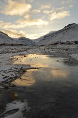 Kite surfing in the ice fjord outside of Longyearbyen in Svalbard (Spitsbergen), Norway