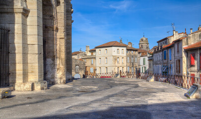 Fototapeta na wymiar View past the Roman amphitheatre of Arles, France