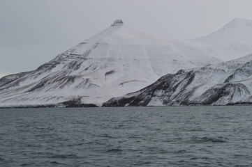 Winter sunset over the ice fjords of the Archipelago of Svalbard (Spitsbergen) in Norway