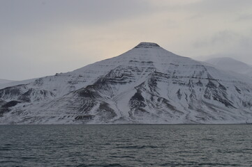 Winter sunset over the ice fjords of the Archipelago of Svalbard (Spitsbergen) in Norway