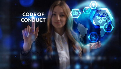 Business, Technology, Internet and network concept. Young businessman working on a virtual screen of the future and sees the inscription: Code of conduct