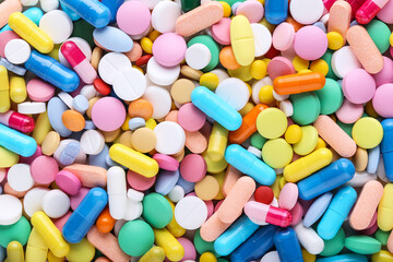 Fototapeta na wymiar Background of colorful medicine pills
