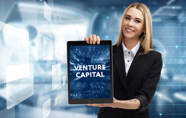 Business, Technology, Internet and network concept. Young businessman working on a virtual screen of the future and sees the inscription: Venture capital