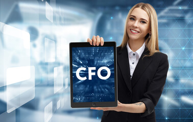 Business, Technology, Internet and network concept. Young businessman working on a virtual screen of the future and sees the inscription: CFO