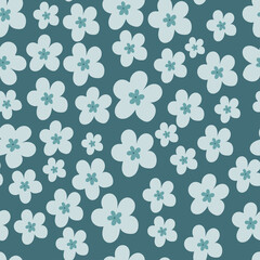 Fototapeta na wymiar Seamless vector pattern with flowers on a blue background. Summer pattern. For wallpaper, textiles, fabric, paper.