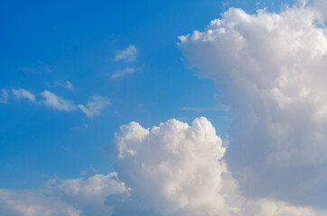 Cumulus clouds on a background of blue sky