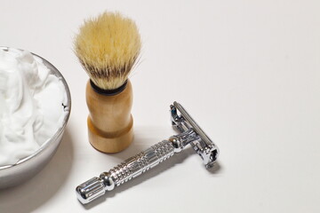 shaving set with blade, brush and bowl with foam