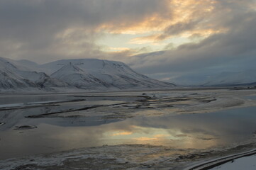 Sunset in the ice fjords of the Norwegian Archipelago of Svalbard, Norway