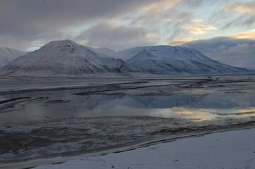 Sunset in the ice fjords of the Norwegian Archipelago of Svalbard, Norway
