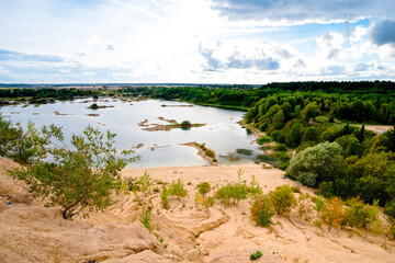 Sandy slope to the river with small Islands, wildlife landscape