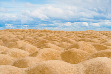 Fototapeta na wymiar Sand dunes of bizarre shape, the landscape is similar to the surface of Mars