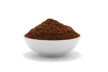 Porcelain bowl with ground coffee.