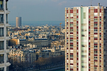 Aerial view of apartments and cityscape of Paris at dusk