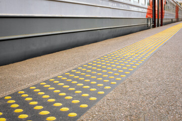 direction signs for the visually impaired on the train platform, accessible environment for the blind, movement assistance