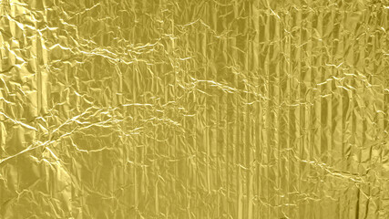 gold foil background with shiny crumpled surface for texture background