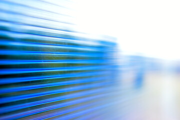 Blue plastic striped polycarbonate surface in the sun