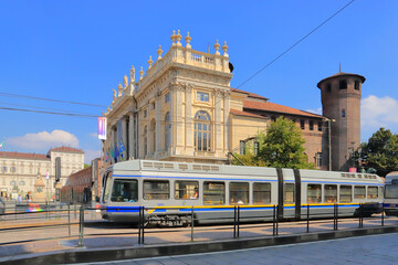 Tram e palazzo madama a torino in italia, streetcat and Madama Palace in Turin city in Italy