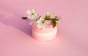 Cosmetic sponges in pastel colors on a pink background